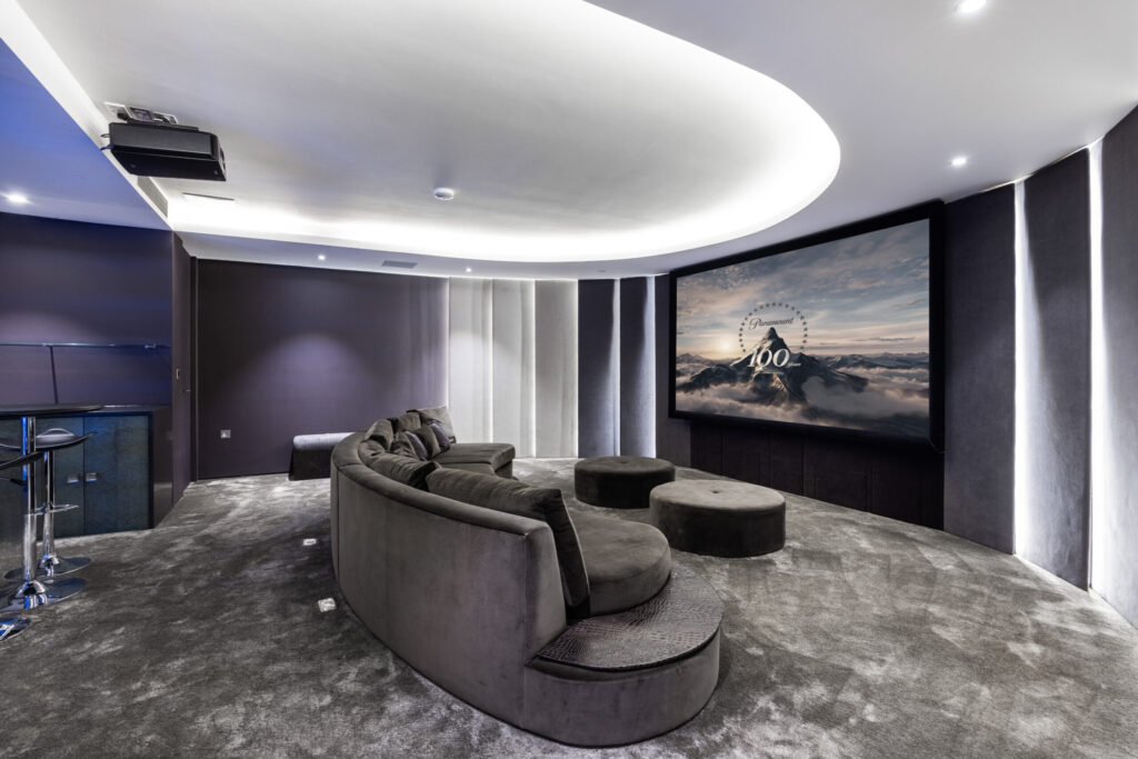 03 1 Cinema Room Modern Luxury Radlett Eco Mansion scaled.jpg