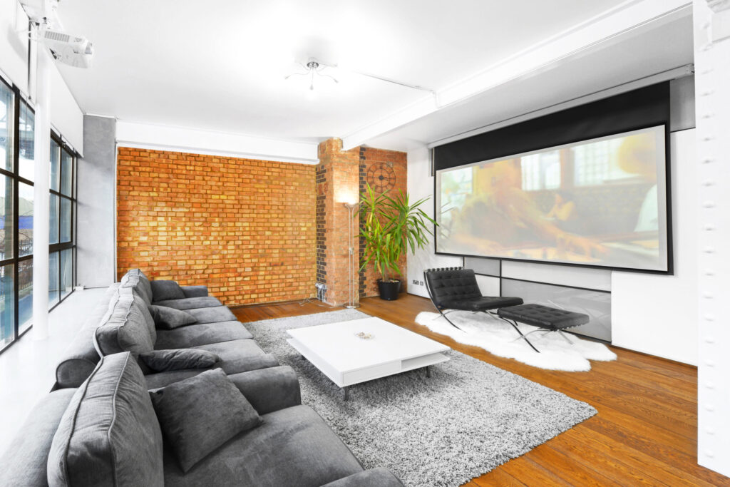 10 Riverside Luxury Warehouse Apartment Cinema Screen East London scaled.jpg